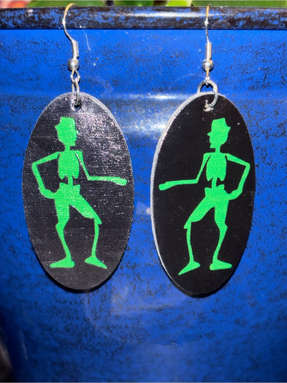 Skeleton neon green dancing earrings